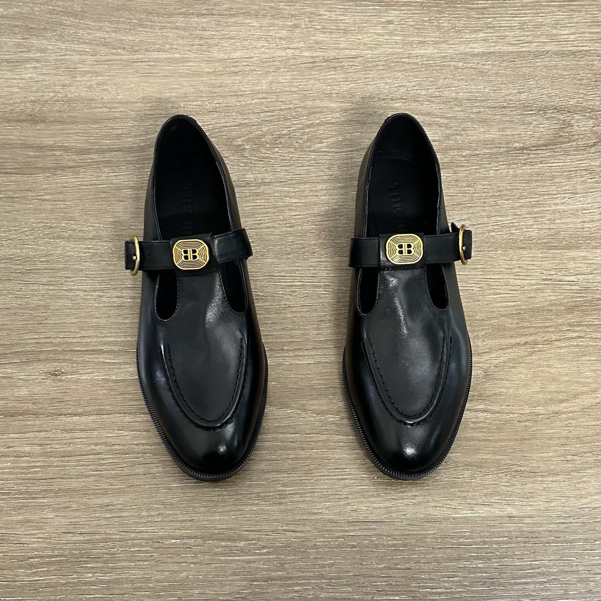 Women's Black Microfiber T-Bar Mary Jane Loafer with Gold BB Logo Buckle and Round Toe